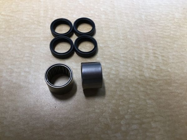 A group of black rubber rings sitting on top of a table.