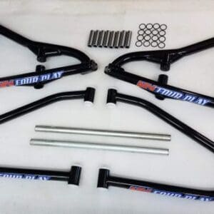 A set of four black motorcycle frames with some springs and bars.