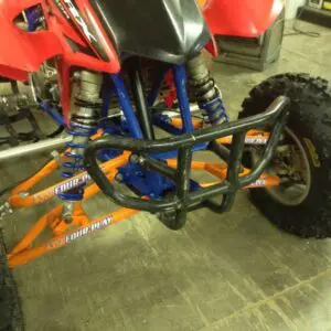 A close up of the front end of an atv.