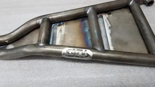 A metal frame with some type of name on it