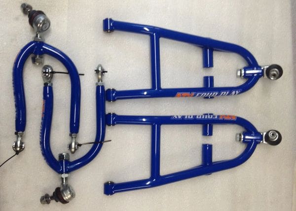 A pair of blue motorcycle suspension arms and a set of front forks.