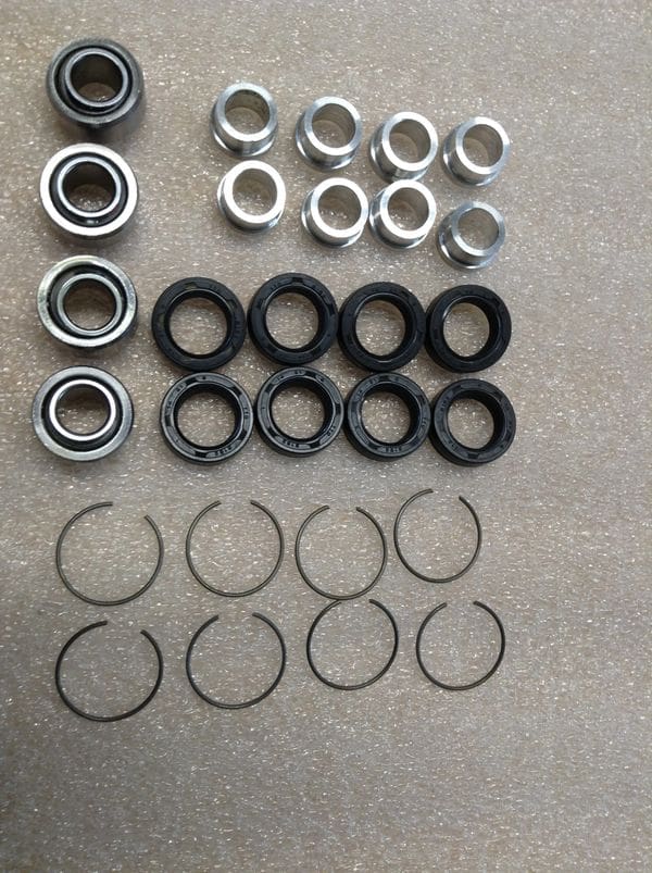 A group of different types of bearings and washers.