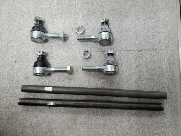 A set of four tie rod ends and two ball joints.