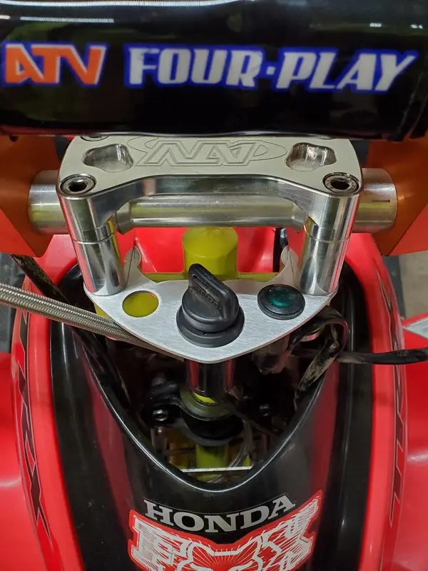 A close up of the steering wheel on a car