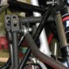 A close up of the front forks on a bicycle.