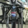 A close up of the front fork on a bicycle.