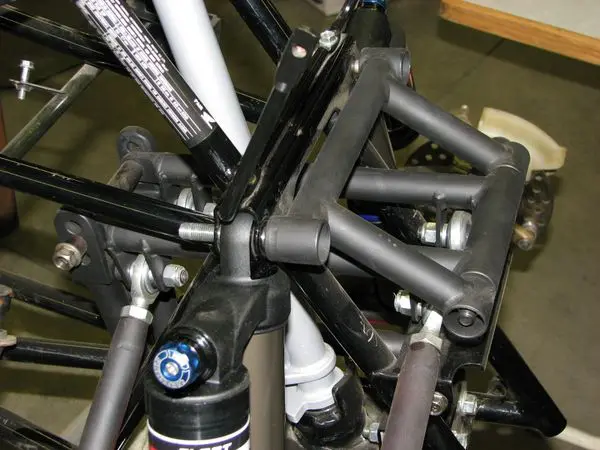 A close up of the frame and fork on a bicycle.