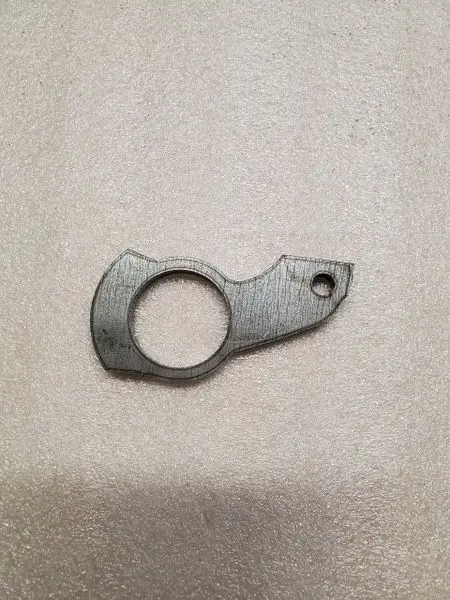 A metal object with a hole in it.